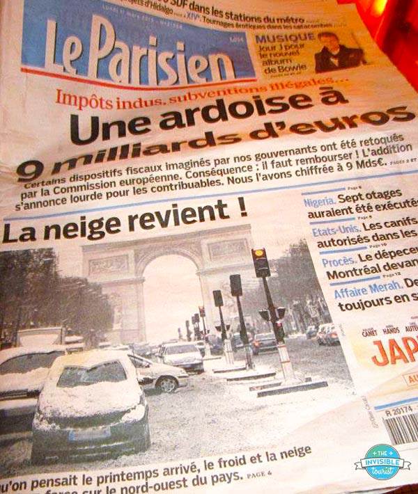Carrying a local paper is a great way to not look like a tourist