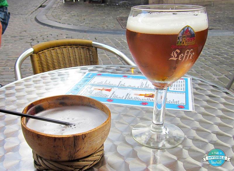 Sampling locally-made coconut beer, served in a coconut-shaped bowl