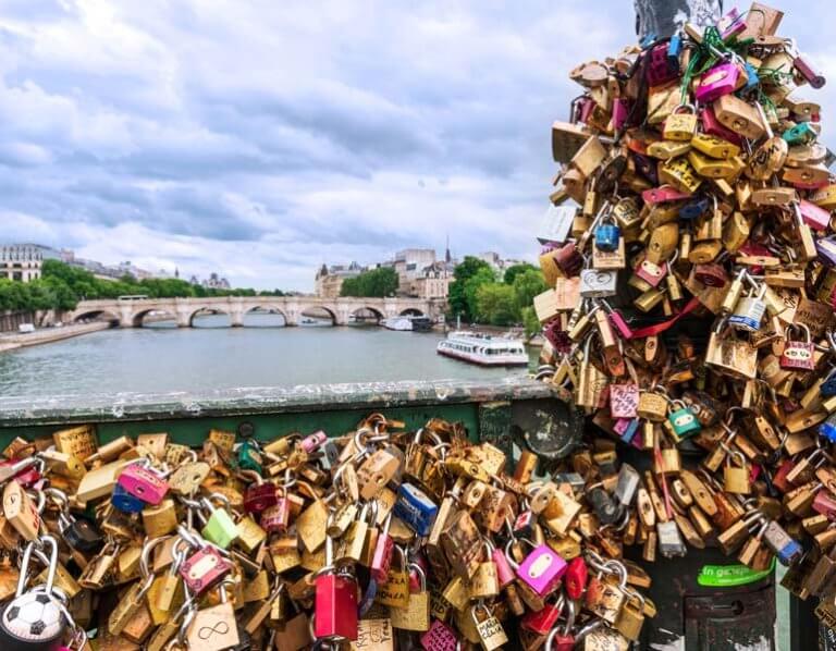 Refraining from leaving love locks is one of the alternative Paris travel tips