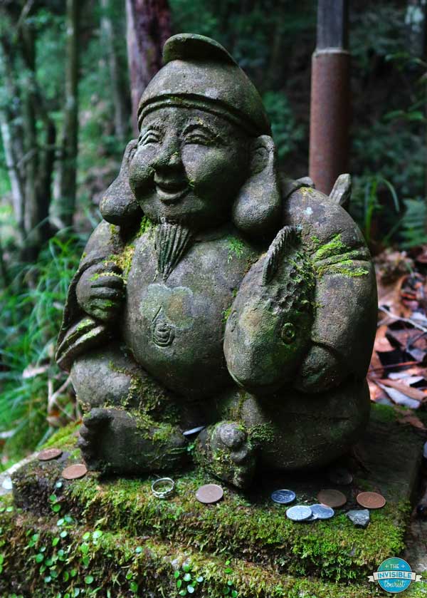 One of the Seven Lucky God stone statues at Kawazu Falls, Izu